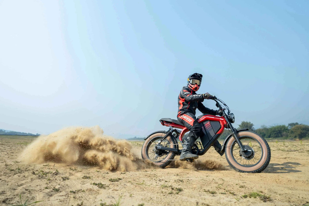 Beginner riding an electric dirt bike on an off-road trail